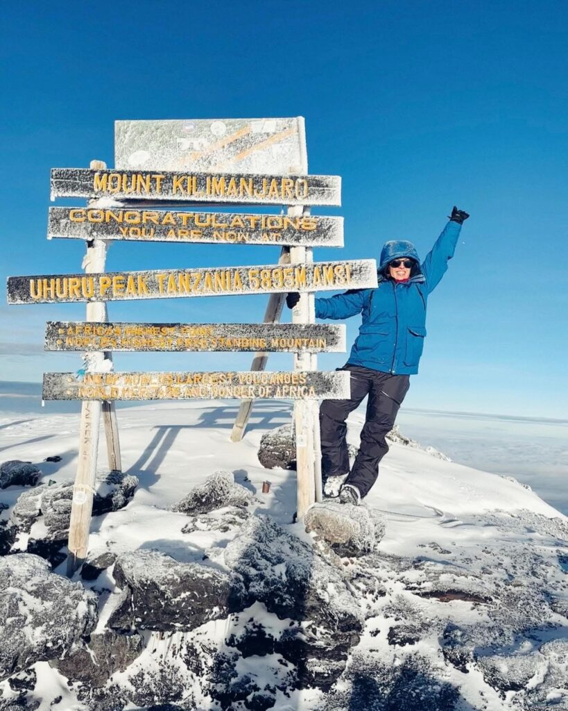 Venvy Lab founder at the Mt. Kilimanjaro summit (Uhuru Peak)