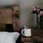 Hormone balancing bedtime drink in a mug on a cozy bed