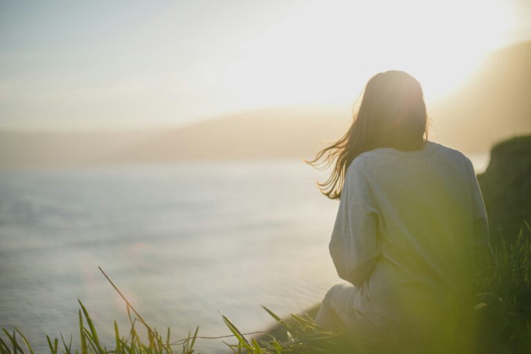 A woman in perimenopause taking in a scenic view